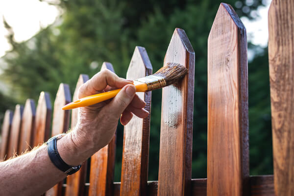 Simple picket fence on a property.